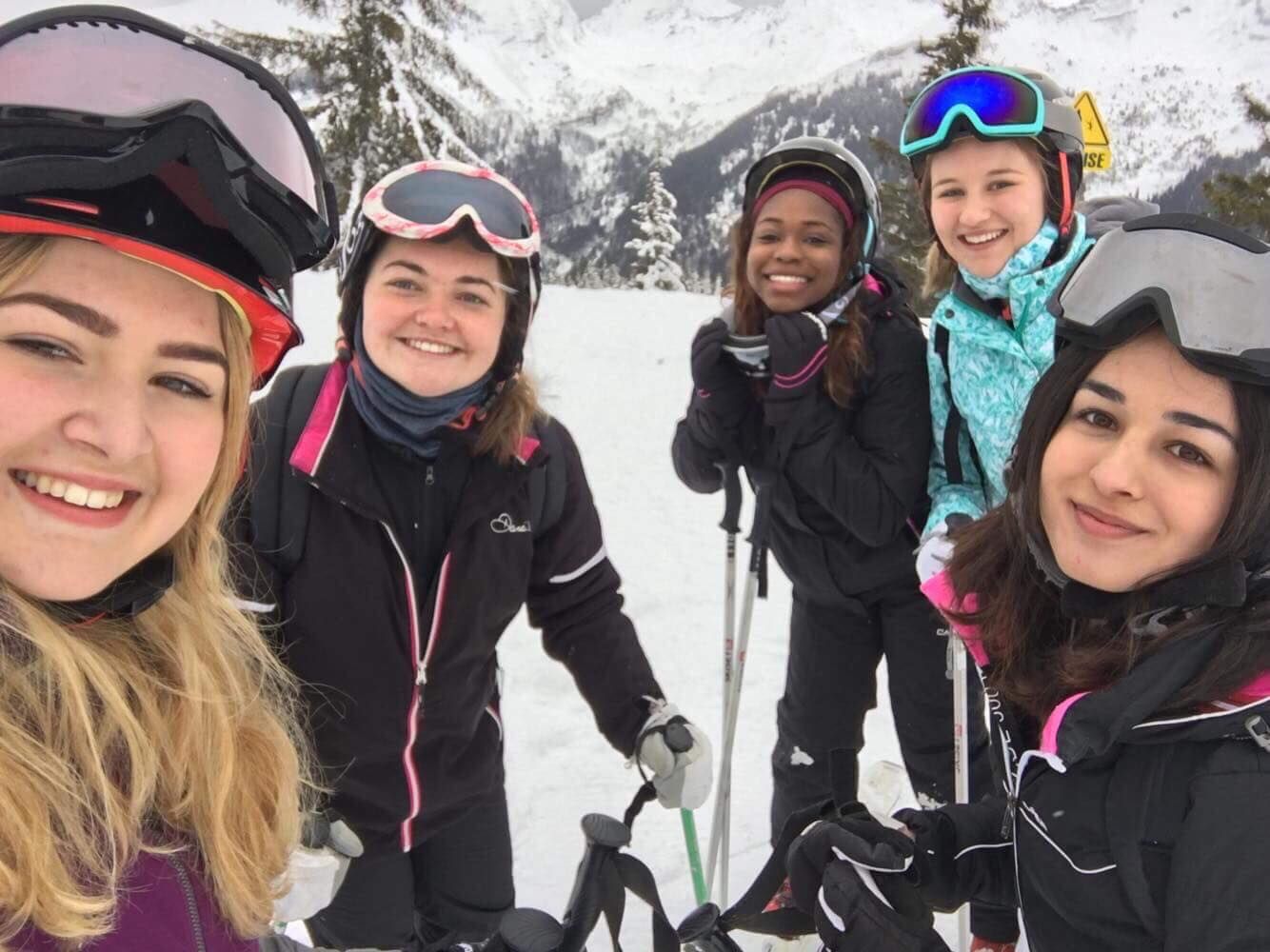 Image may contain: Smile, Portrait, Face, Sports, Sport, Snow, Skiing, Outdoors, Person, People, Human