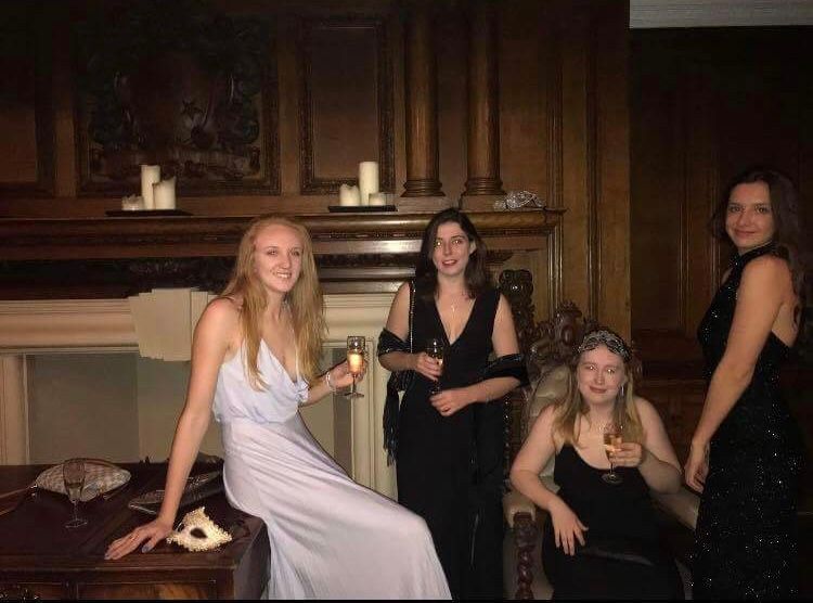 Image may contain: Robe, Gown, Clothing, Night Life, Person, People, Human