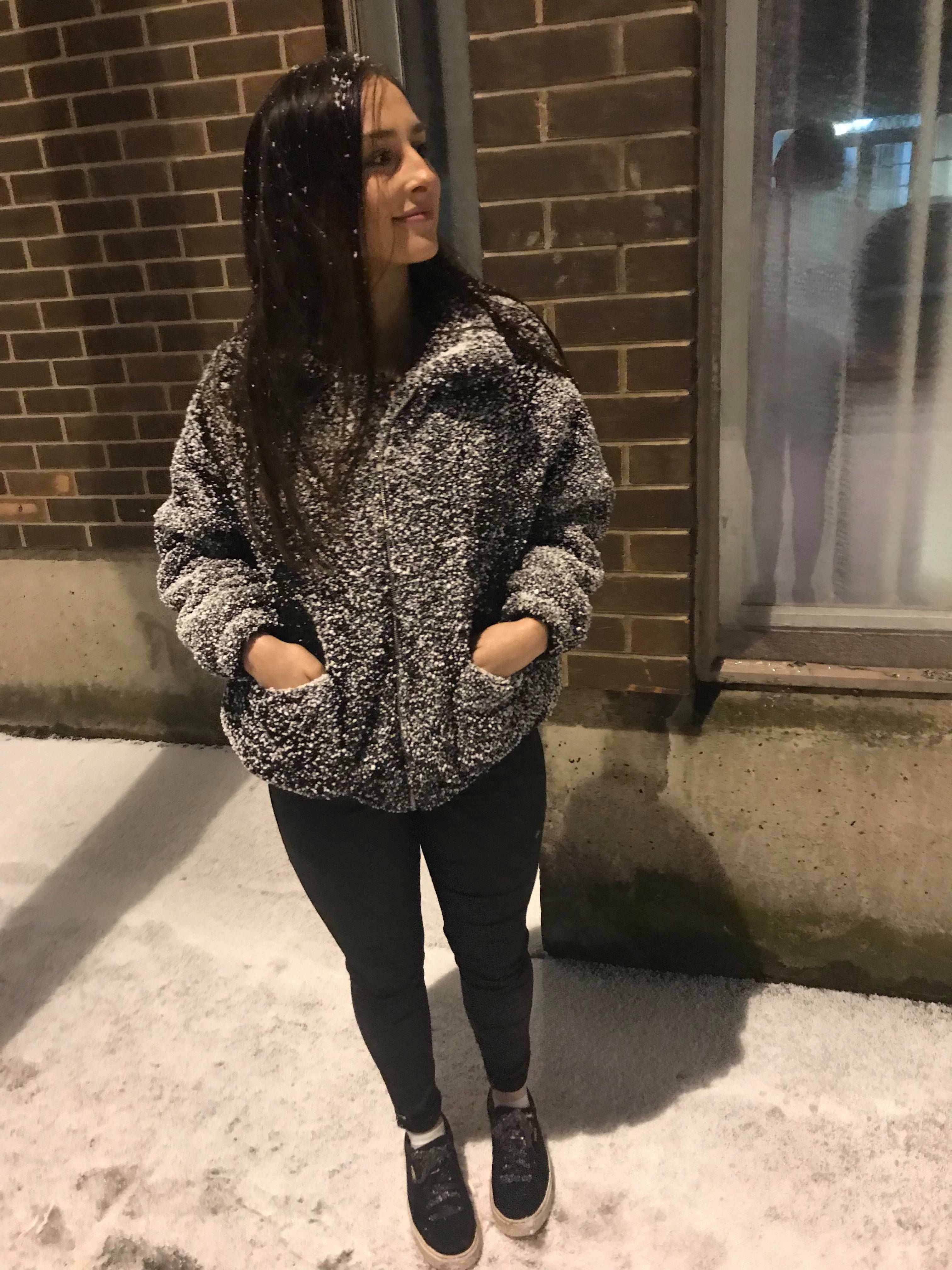 Image may contain: Sweater, Clothing, Cardigan, Person, People, Human