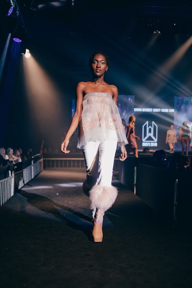 Image may contain: Leisure Activities, Dance Pose, Dance, Runway, Person, People, Human