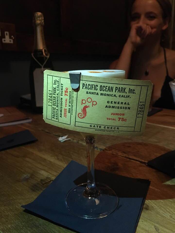 Image may contain: Book, Glass, Person, People, Human