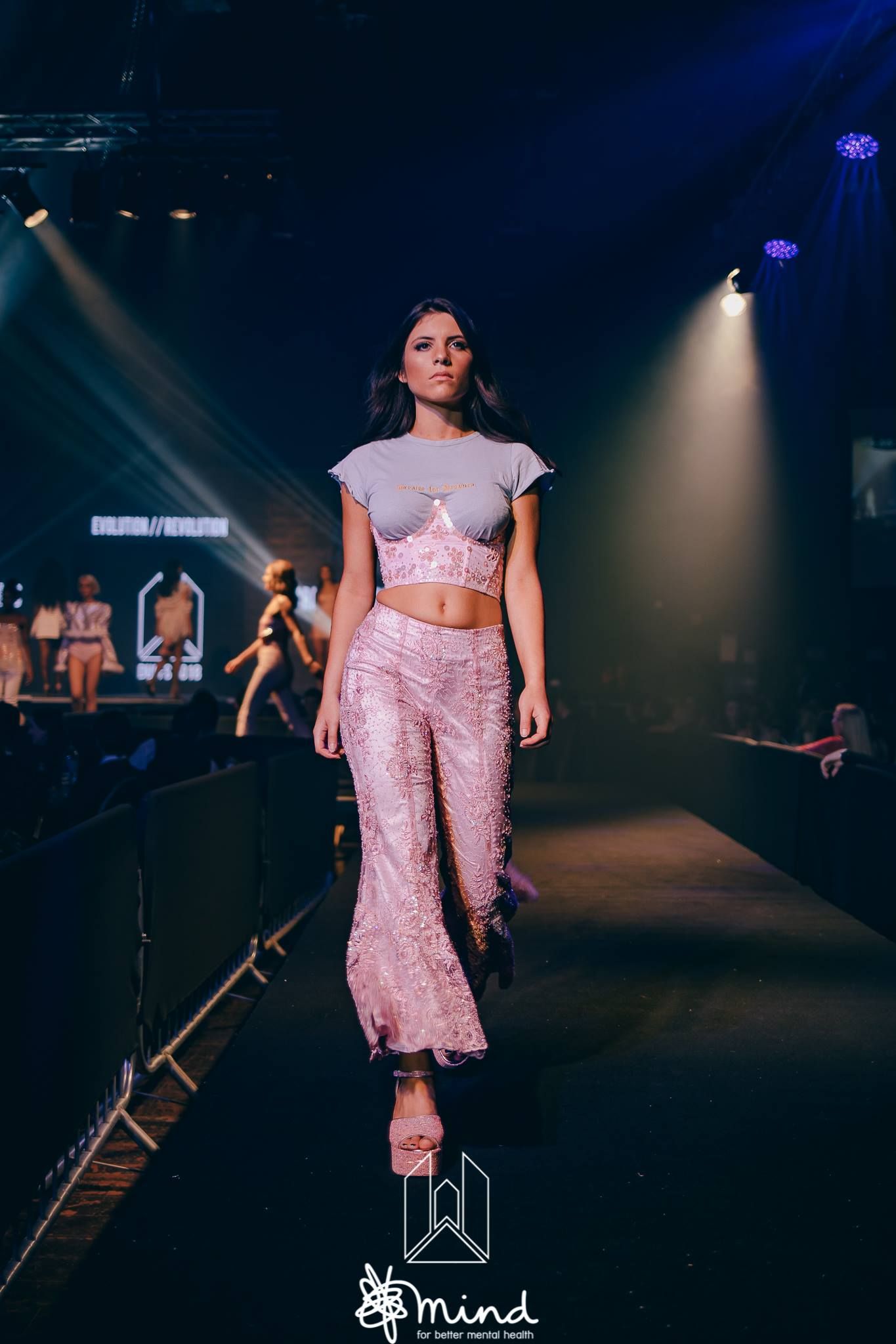 Image may contain: Female, Poster, Runway, Person, People, Human