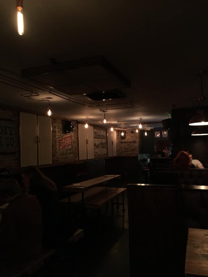 Image may contain: Restaurant, Cafe, Pub, Bar Counter, Person, People, Human