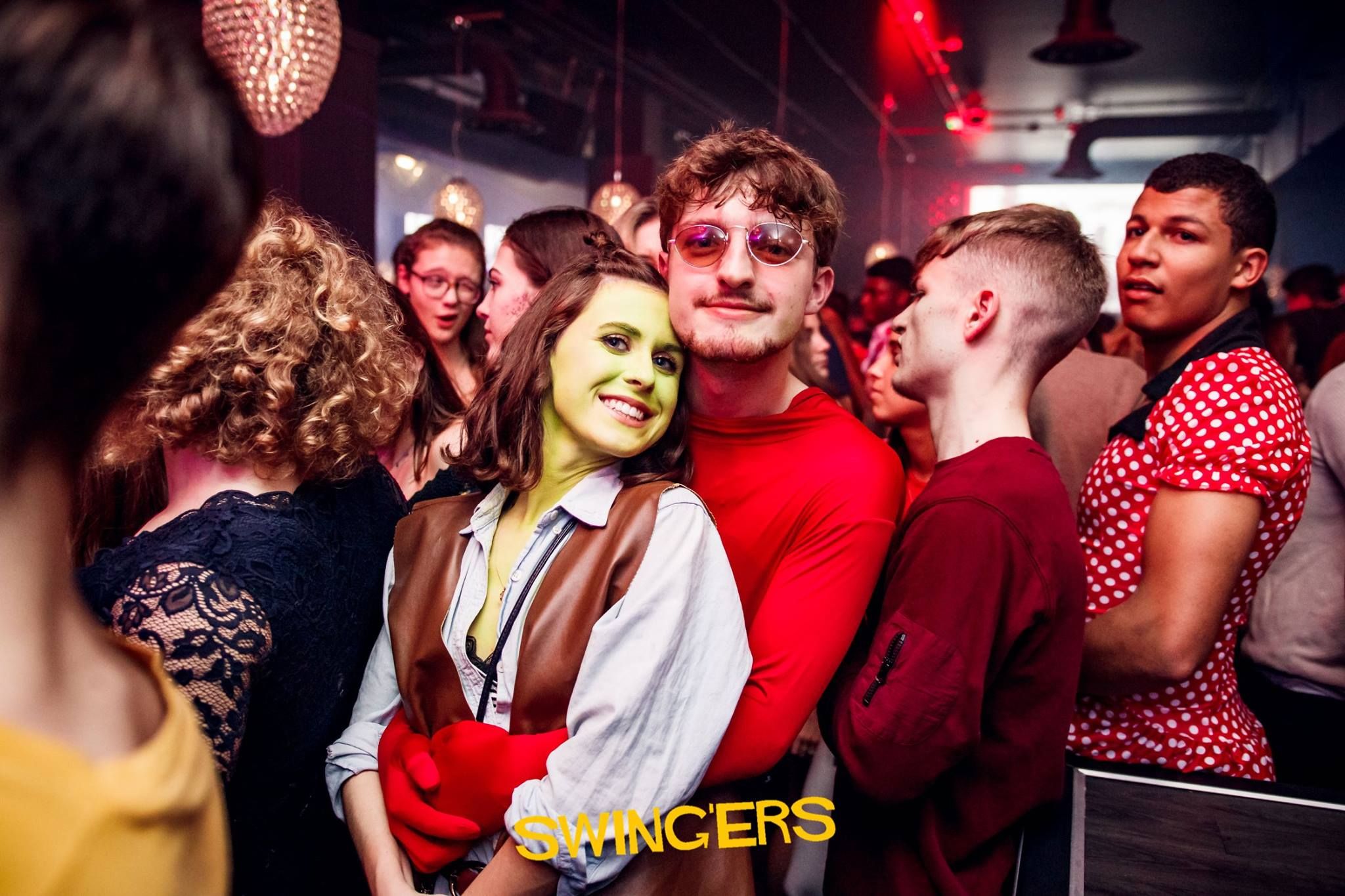 Image may contain: Disco, Night Club, Club, Accessory, Accessories, Sunglasses, Party, Human, Person
