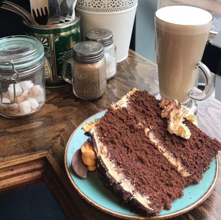 Image may contain: Dish, Meal, Furniture, Table, Dining Table, Beverage, Drink, Hot Chocolate, Coffee Cup, Cup, Chocolate, Dessert, Sweets, Confectionery, Food, Sandwich