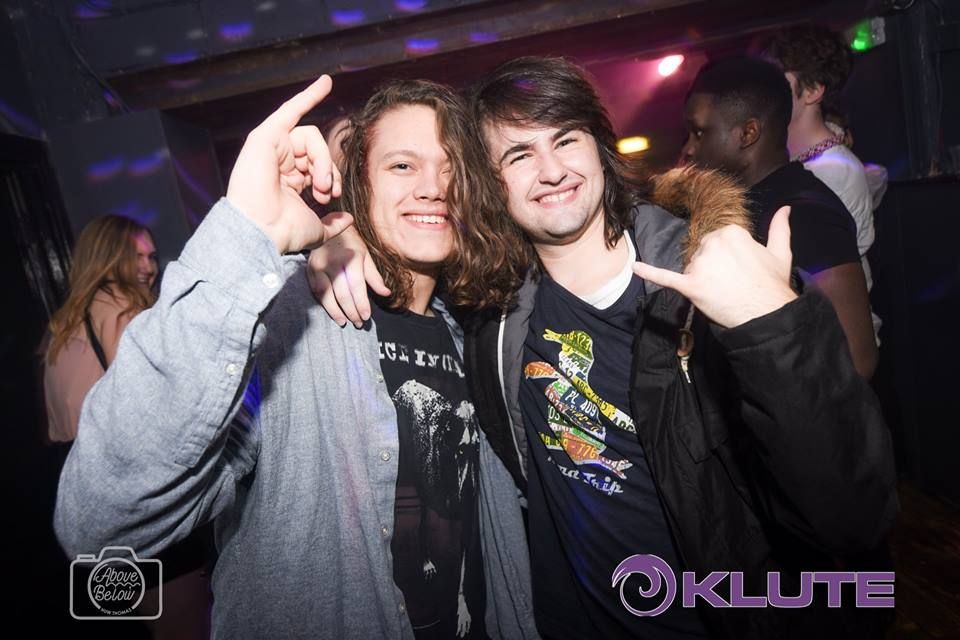 Image may contain: Face, Jacket, Coat, Night Club, Clothing, Apparel, Club, Party, Human, Person