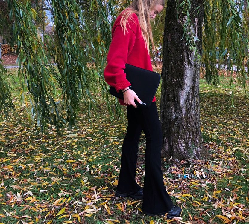 Image may contain: Female, Tree Trunk, Leaf, Person, Human, Clothing, Apparel, Plant, Tree