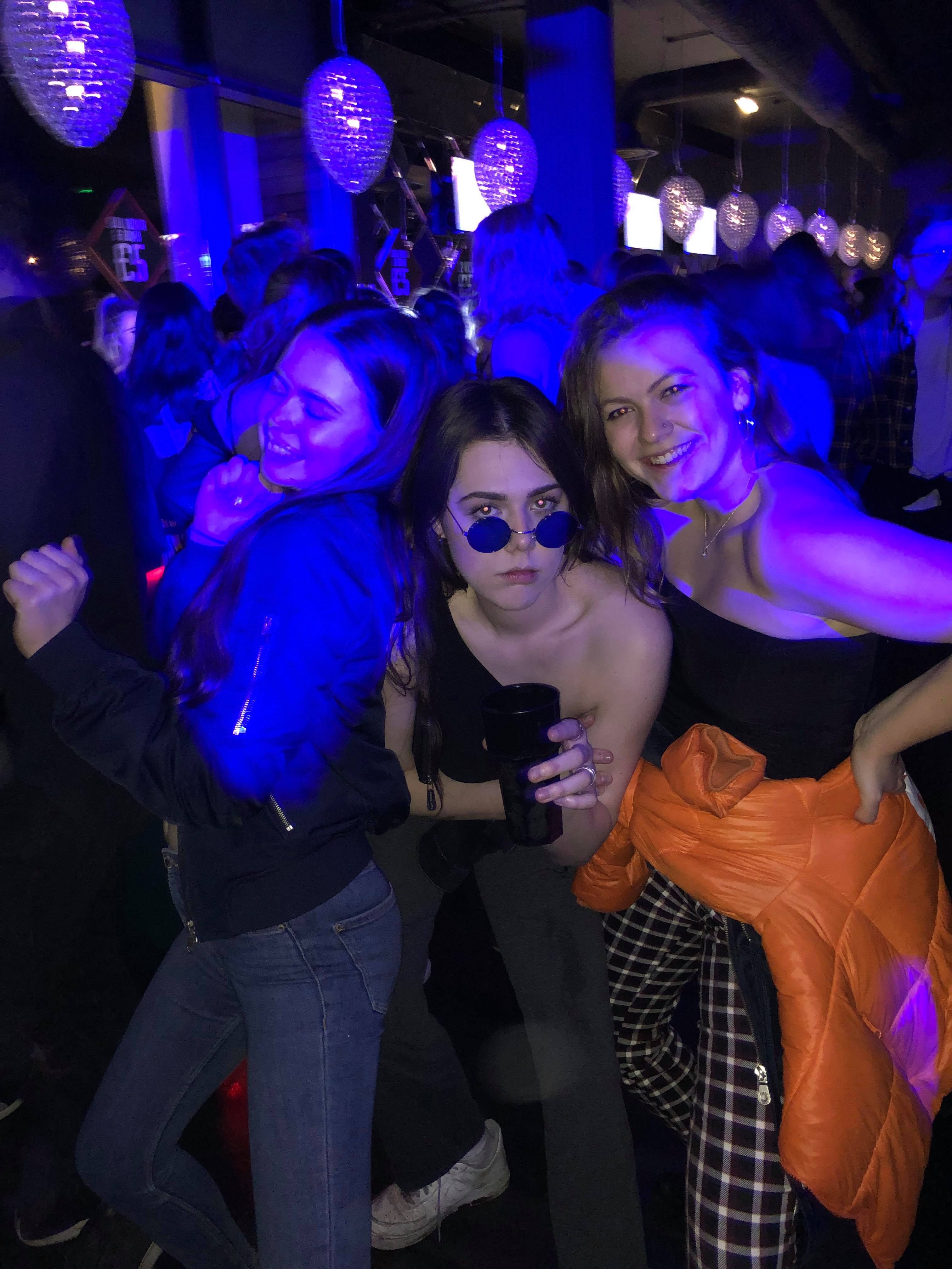 Image may contain: Leisure Activities, Disco, Party, Night Club, Accessories, Accessory, Sunglasses, Night Life, Club, Human, Person