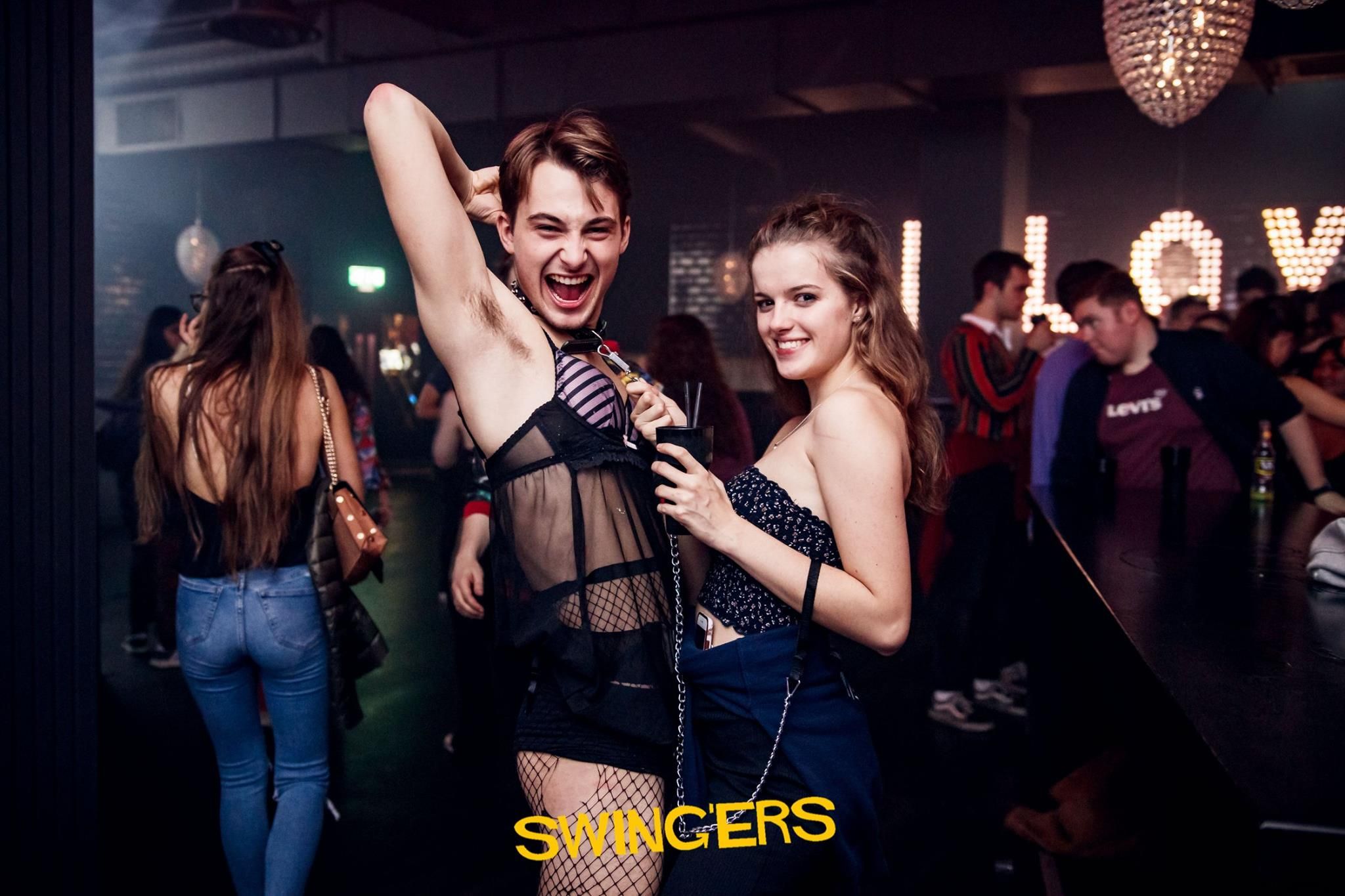 Image may contain: Night Life, Night Club, Club, Person, Human, Apparel, Pants, Denim, Jeans, Clothing