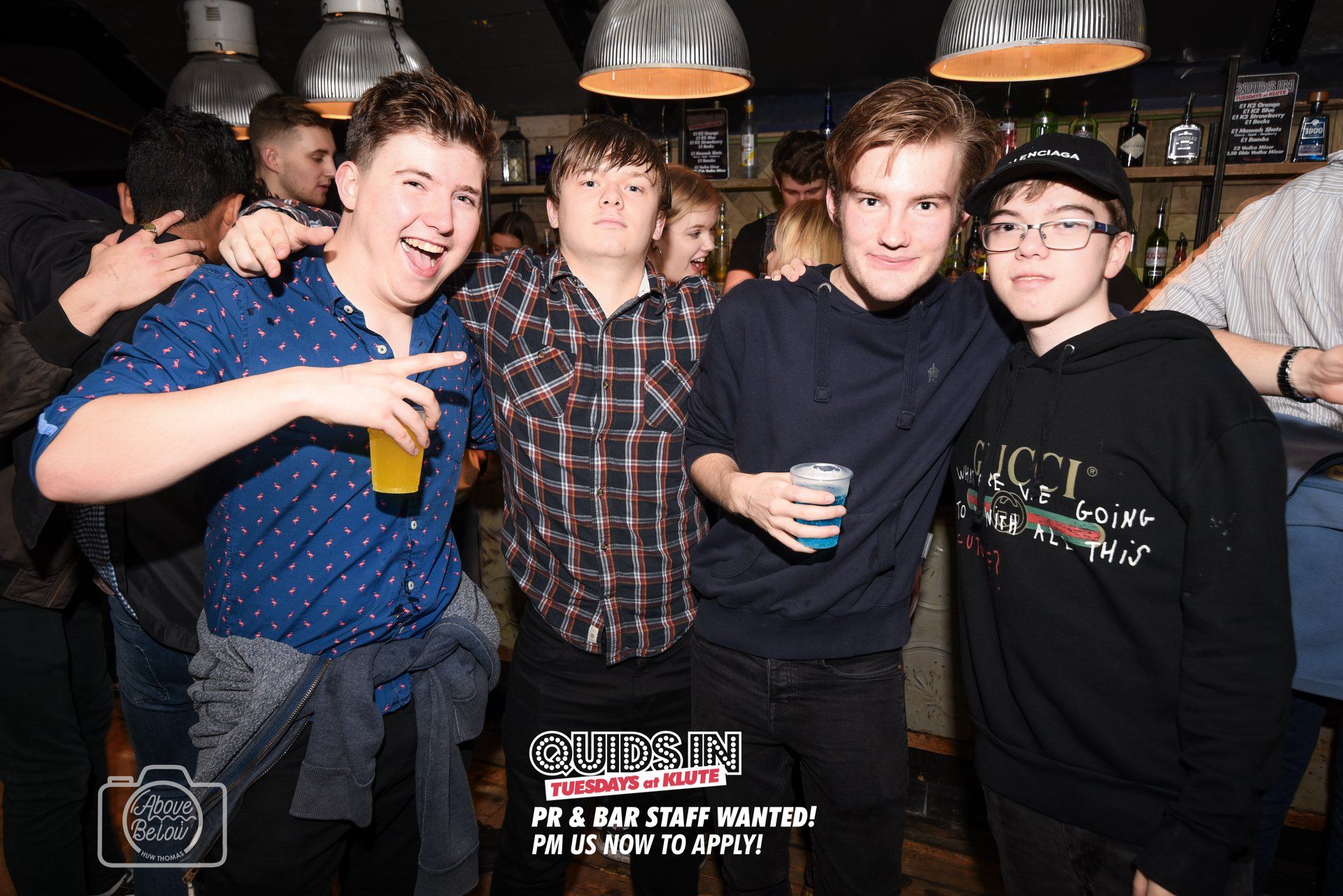 Image may contain: Pants, Glasses, Accessories, Accessory, Night Club, Bar Counter, Pub, Club, Clothing, Apparel, Human, Person
