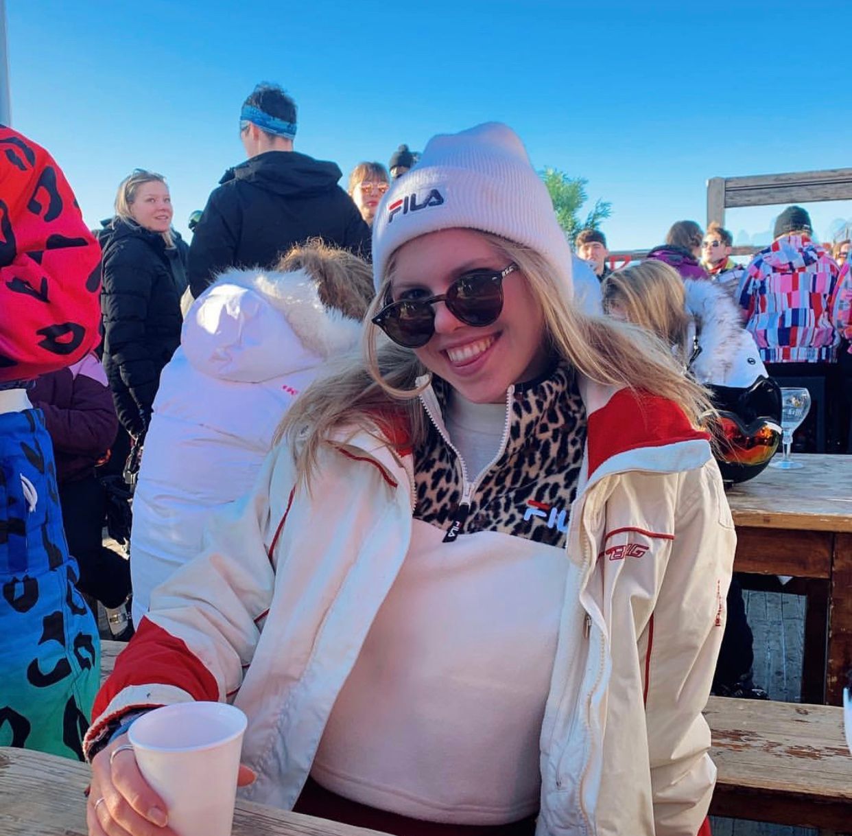 Image may contain: Cap, Wood, Vacation, Hat, Human, Person, Sunglasses, Accessory, Accessories, Clothing, Apparel