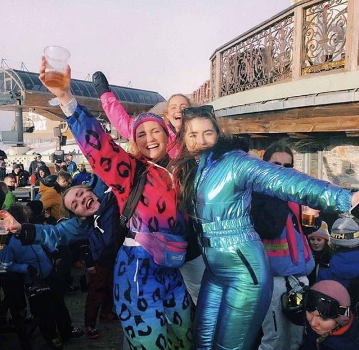 Image may contain: People, Portrait, Photo, Photography, Woman, Leisure Activities, Party, Pants, Smile, Crowd, Female, Face, Helmet, Human, Person, Apparel, Clothing, Costume