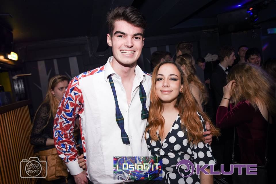 Image may contain: Apparel, Clothing, Face, Night Life, Night Club, Club, Party, Human, Person