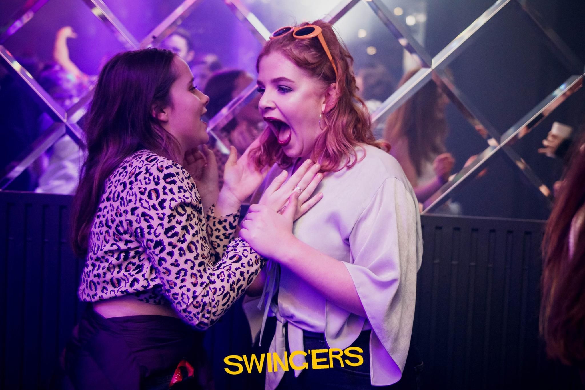 Image may contain: Disco, Night Life, Party, Accessories, Accessory, Sunglasses, Night Club, Club, Human, Person