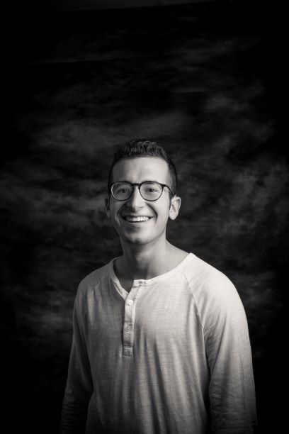 Image may contain: Laughing, Portrait, Photo, Photography, Boy, Glasses, Accessory, Accessories, Person, Human, Smile, Face
