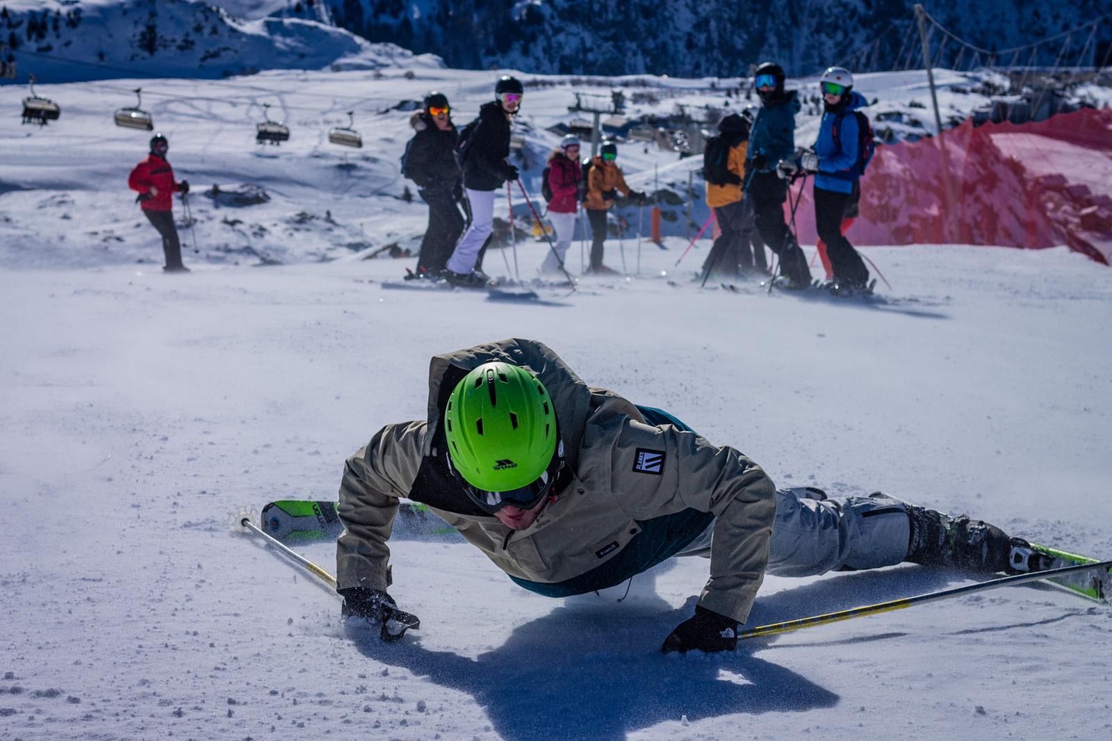 Image may contain: Footwear, Sled, Toy, Slide, Piste, Snow, Sports, Sport, Outdoors, Nature, Helmet, Apparel, Clothing, Person, Human