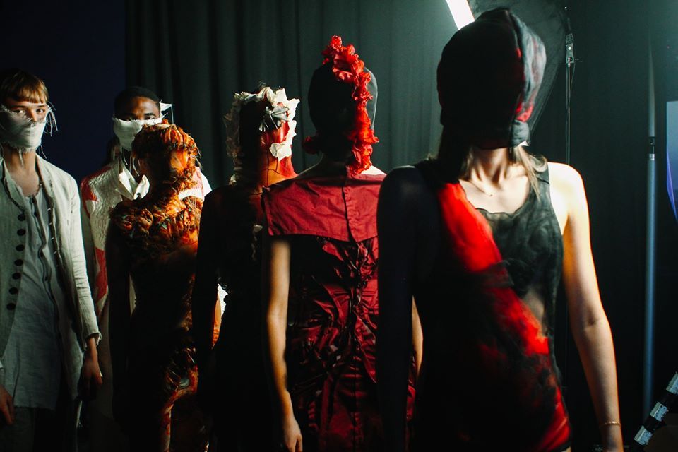 Image may contain: Apparel, Clothing, Festival, Crowd, Stage, Leisure Activities, Dance Pose, Costume, Skin, Person, Human
