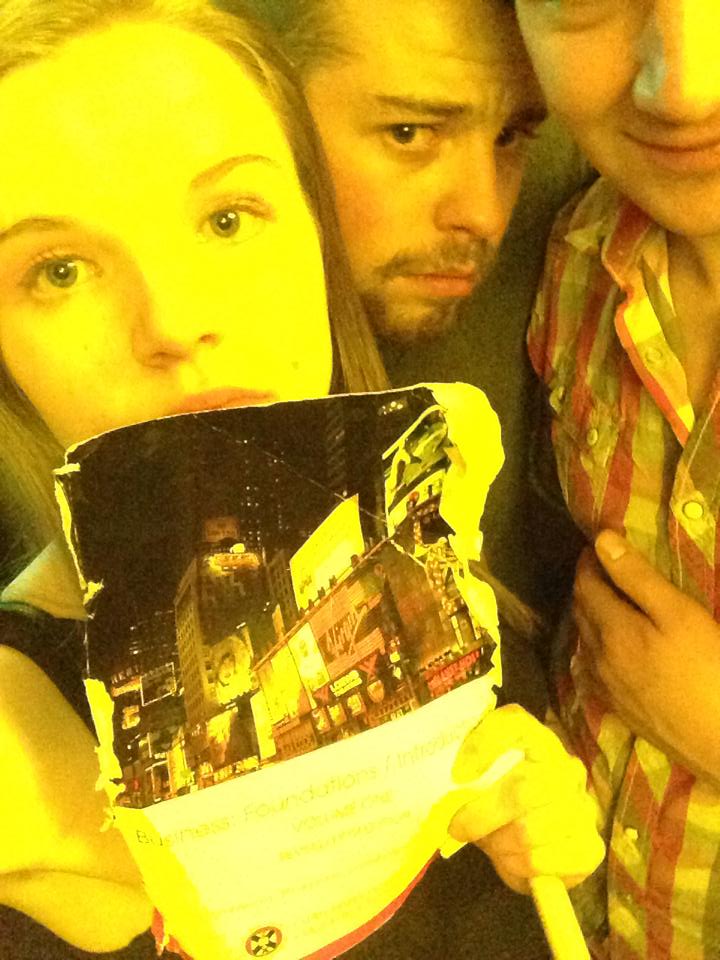 just some selfies of some strangers and the cover page of my textbook