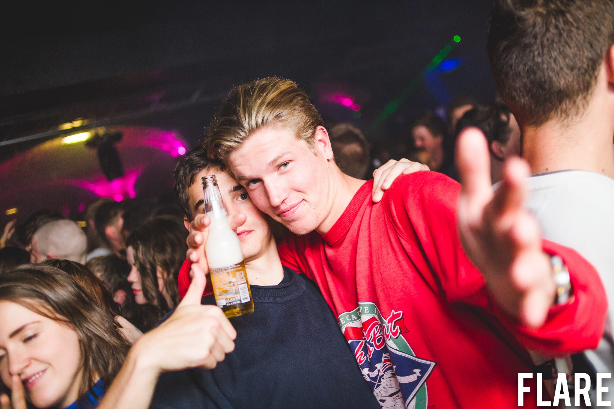 Bottle-in-the-face-hand-in-the-camera-guy