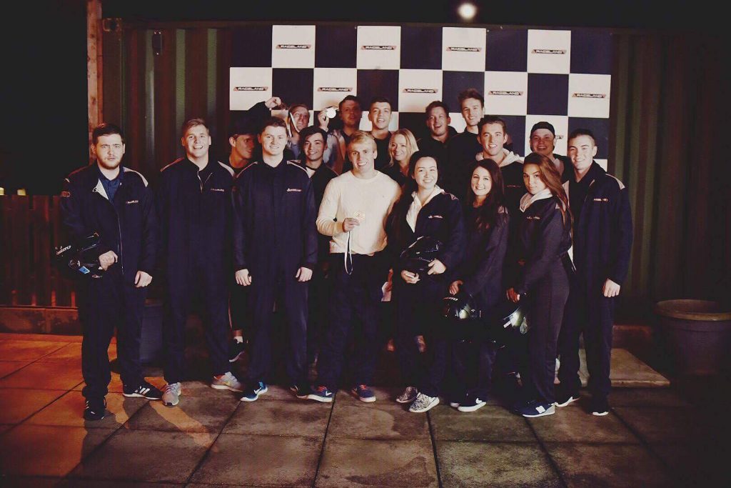 Jamie with the staff after going go-karting