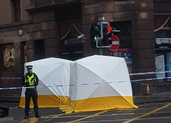 Police last night at the crime scene (Image: Twitter/alex_m_orr)