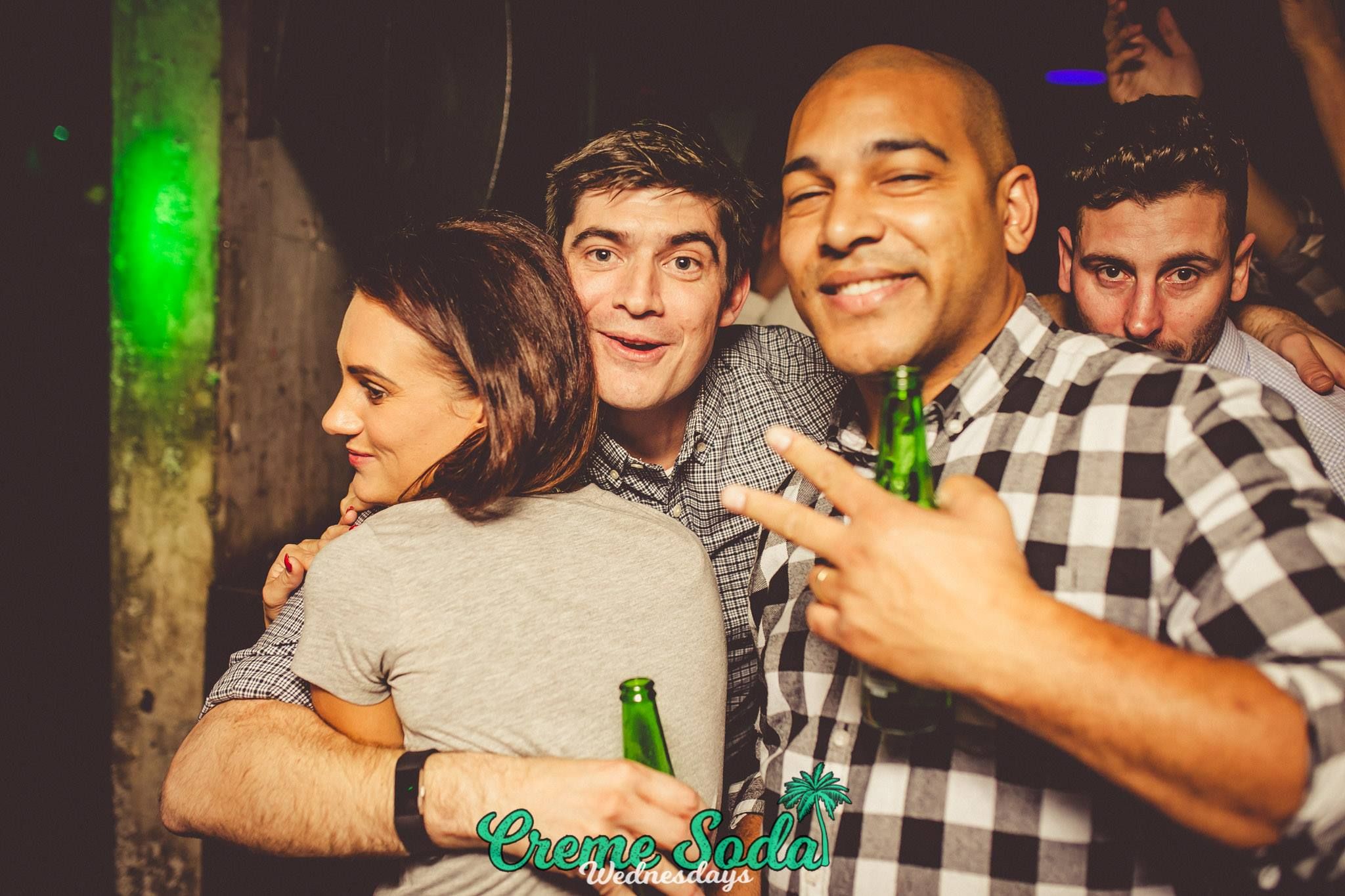 Image may contain: Portrait, Head, Night Life, Night Club, Club, Wrist, Hand, Human, Person, People