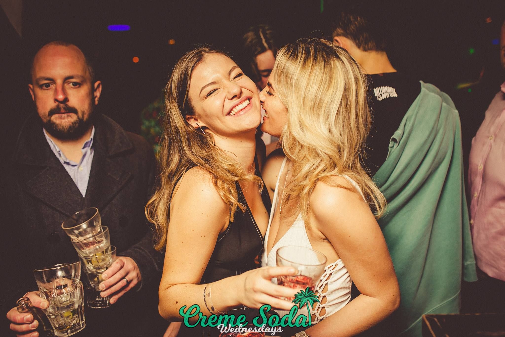 Image may contain: Swimwear, Maillot, Bikini, Night Life, Night Club, Club, Make Out, Human, Person, People