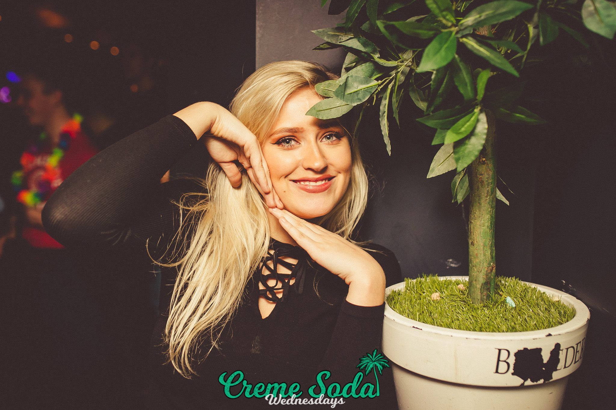 Image may contain: Light, Laser, Dill, Tree, Potted Plant, Plant, Bonsai, Woman, Female, Blonde, Human, Person, People