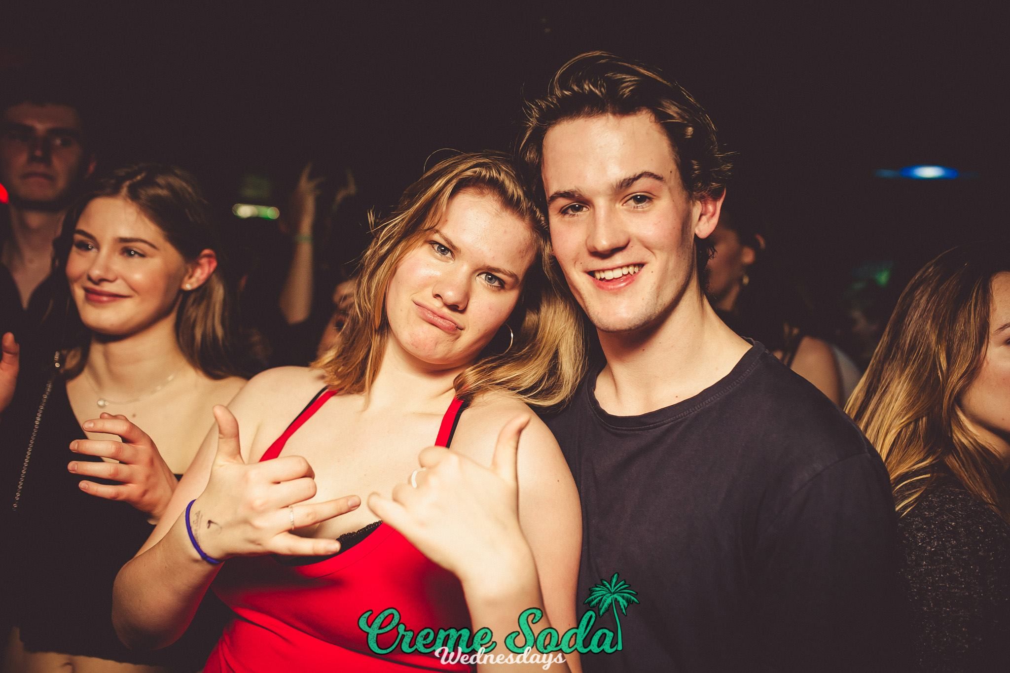 Image may contain: Night Life, Night Club, Club, Smile, Portrait, Face, Person, People, Human