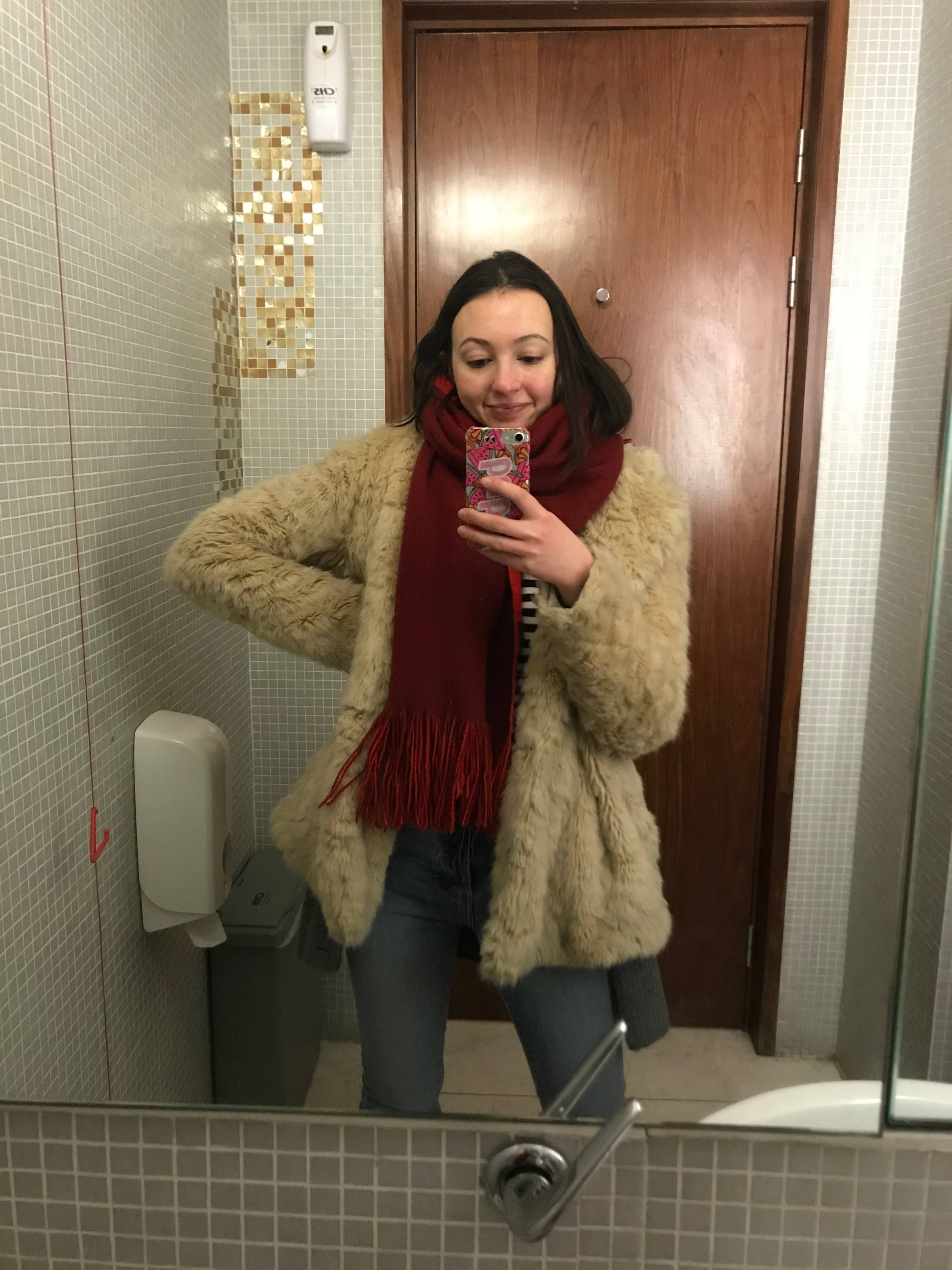 Image may contain: Sweater, Clothing, Cardigan, Toilet, Person, People, Human