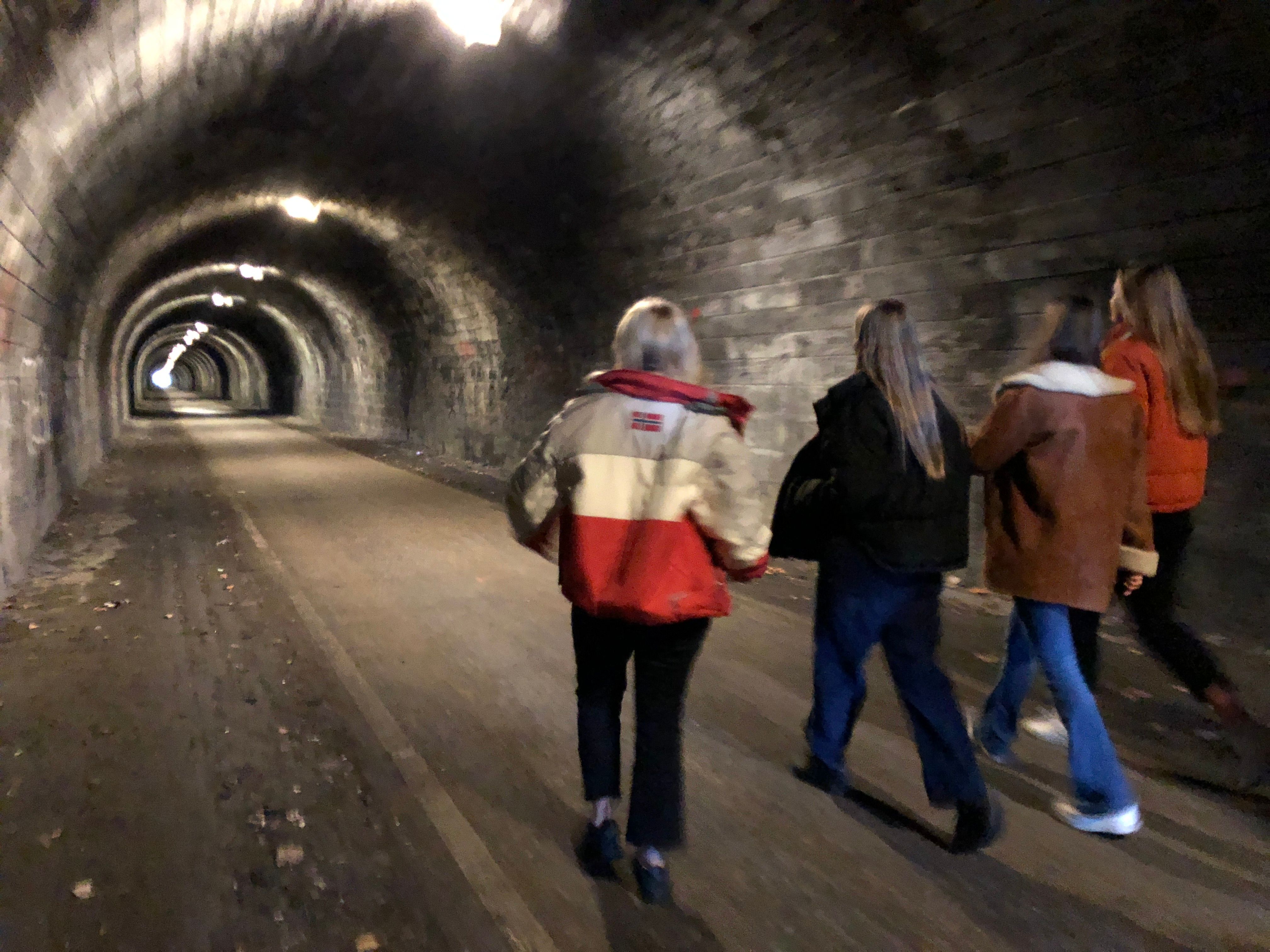 Image may contain: Tunnel, Person, People, Human
