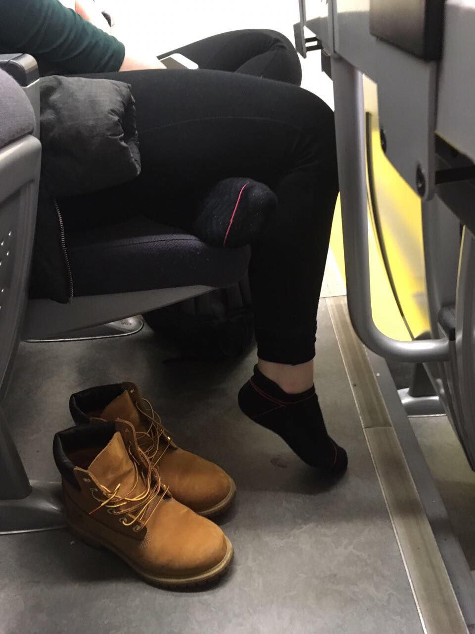 Image may contain: Footwear, Clothing, Chair, Furniture, Couch, Person, People, Human