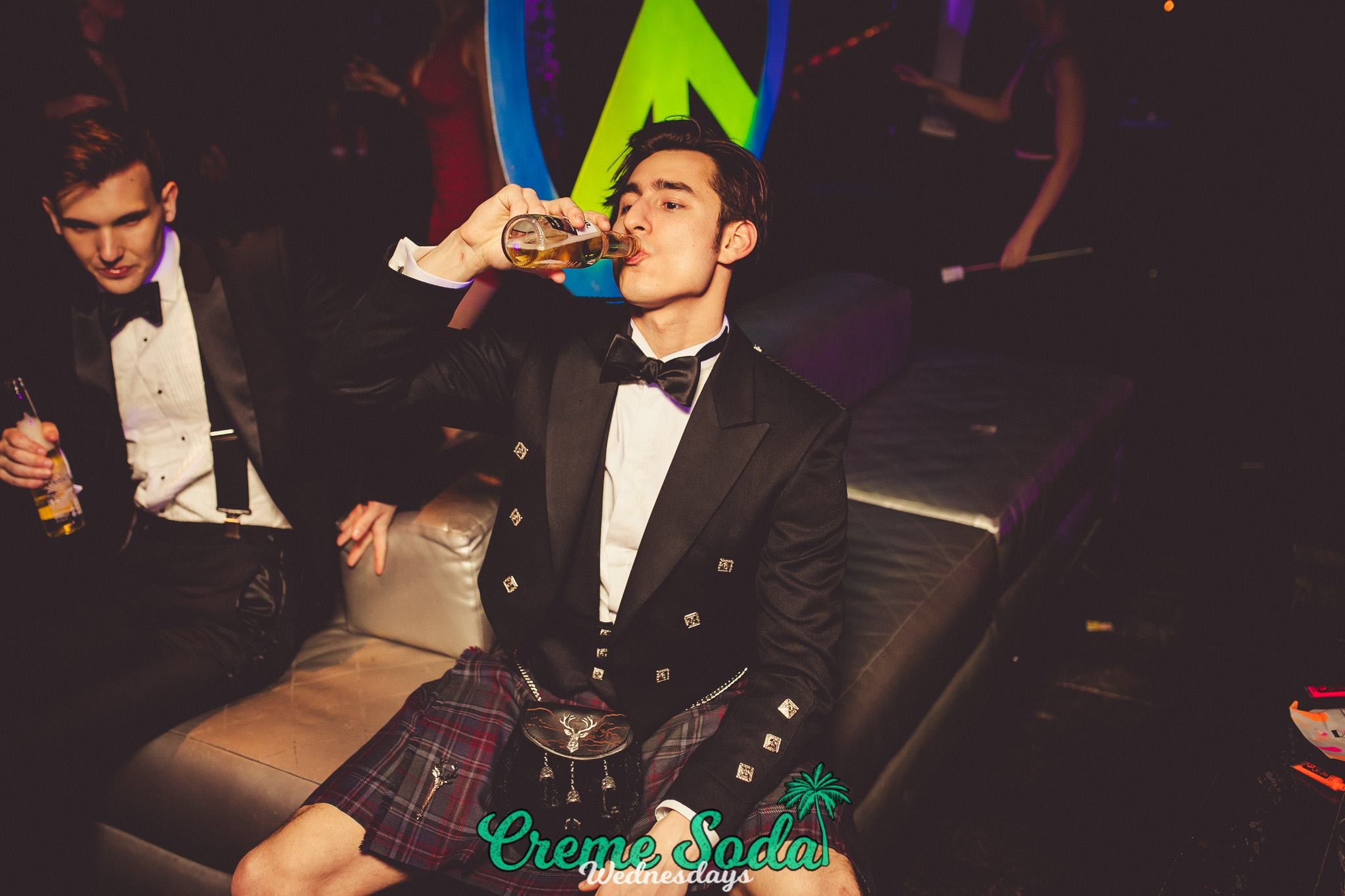 Image may contain: Night Life, Night Club, Club, Paper, Confetti, Jacket, Coat, Blazer, Person, People, Human, Tartan, Skirt, Plaid, Kilt, Clothing