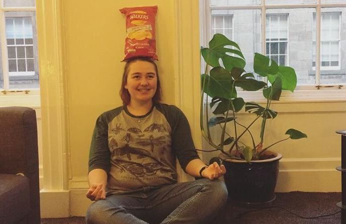 Image may contain: Smile, Portrait, Face, Vase, Pottery, Potted Plant, Plant, Jar, Flora, Person, People, Human