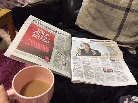 Image may contain: Text, Newspaper, Book