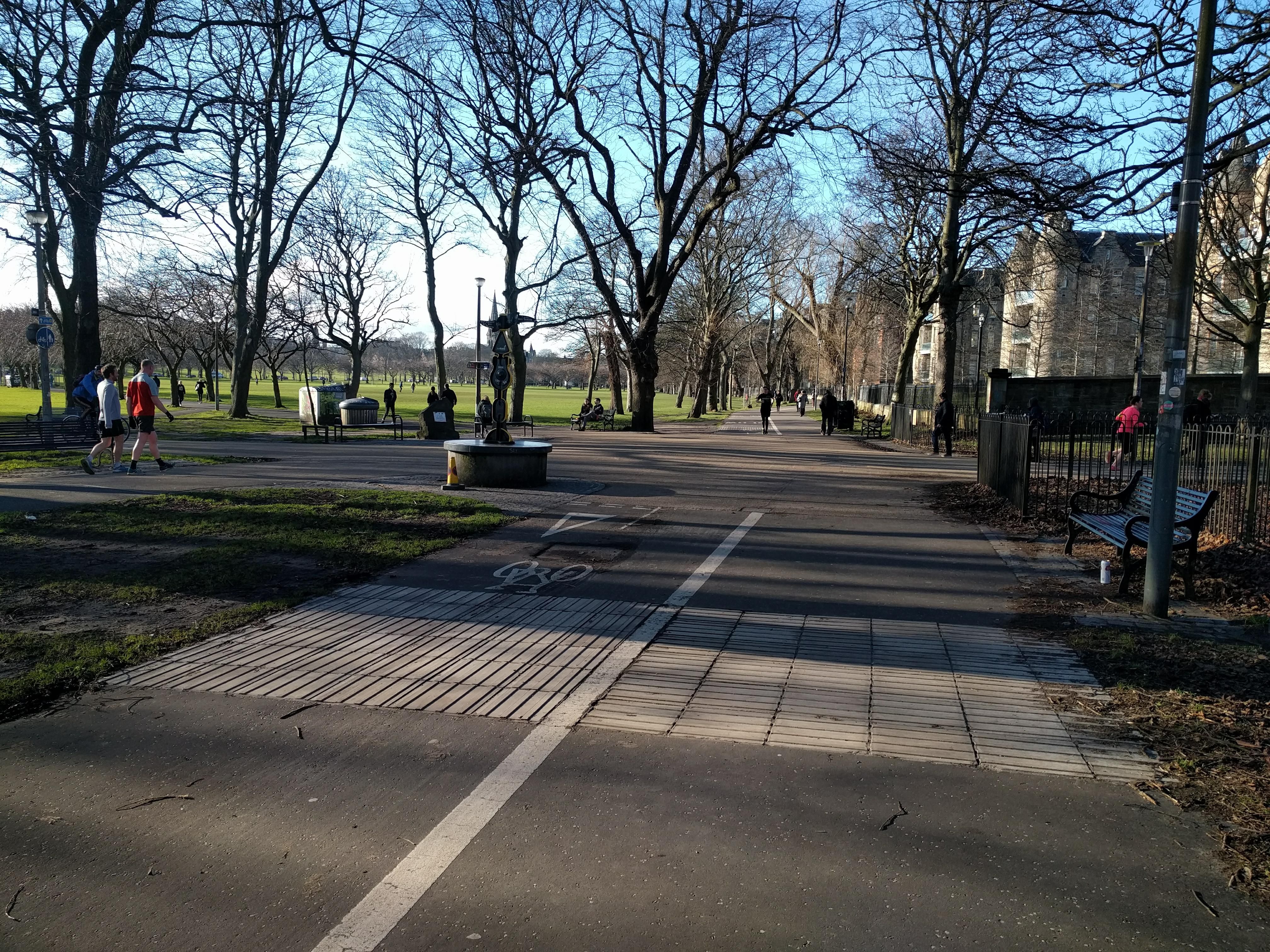 Image may contain: Zebra Crossing, Tarmac, Road, Asphalt, Bench