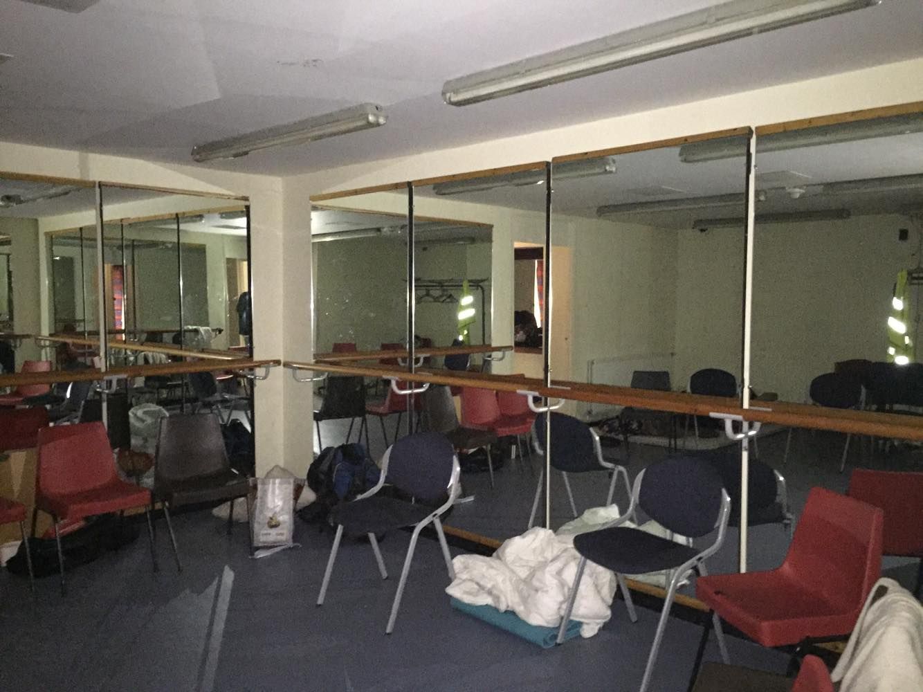 Image may contain: Room, Meeting Room, Indoors, Conference Room, Furniture, Chair