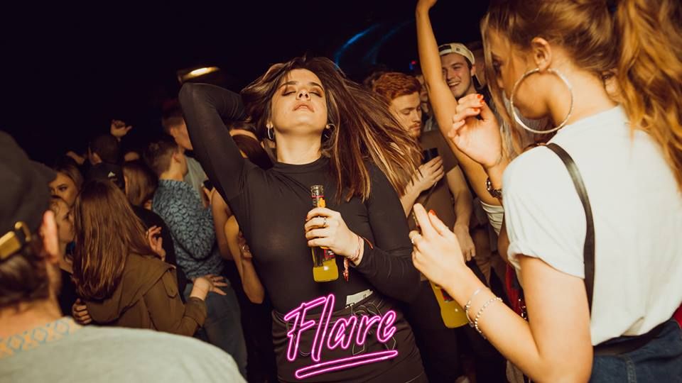 Image may contain: Crowd, Party, Make Out, Music, Leisure Activities, Person, People, Human