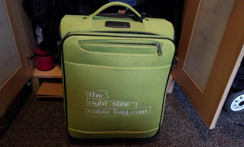 Image may contain: Luggage, Furniture, Chair