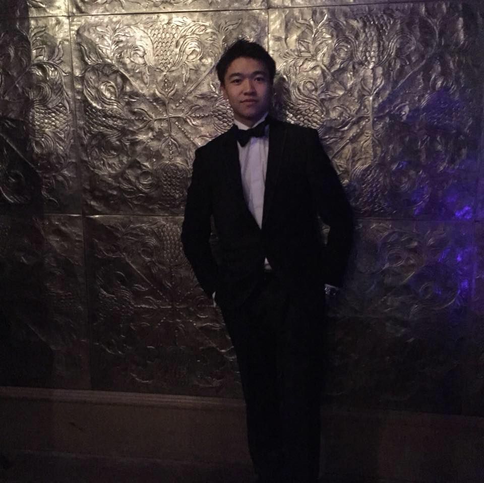 Image may contain: Tuxedo, Suit, Overcoat, Coat, Clothing, Person, People, Human