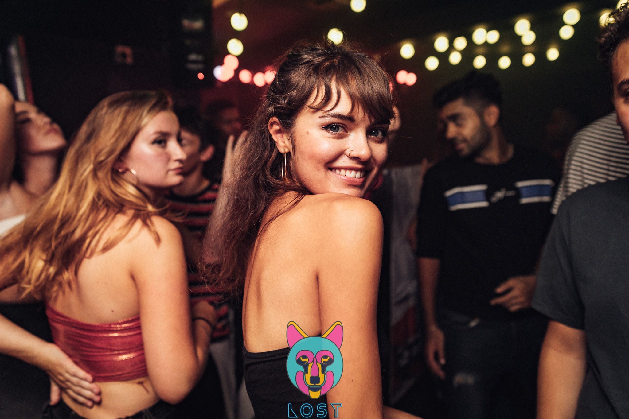 Image may contain: Night Life, Night Club, Club, Back, Underwear, Lingerie, Clothing, Person, People, Human