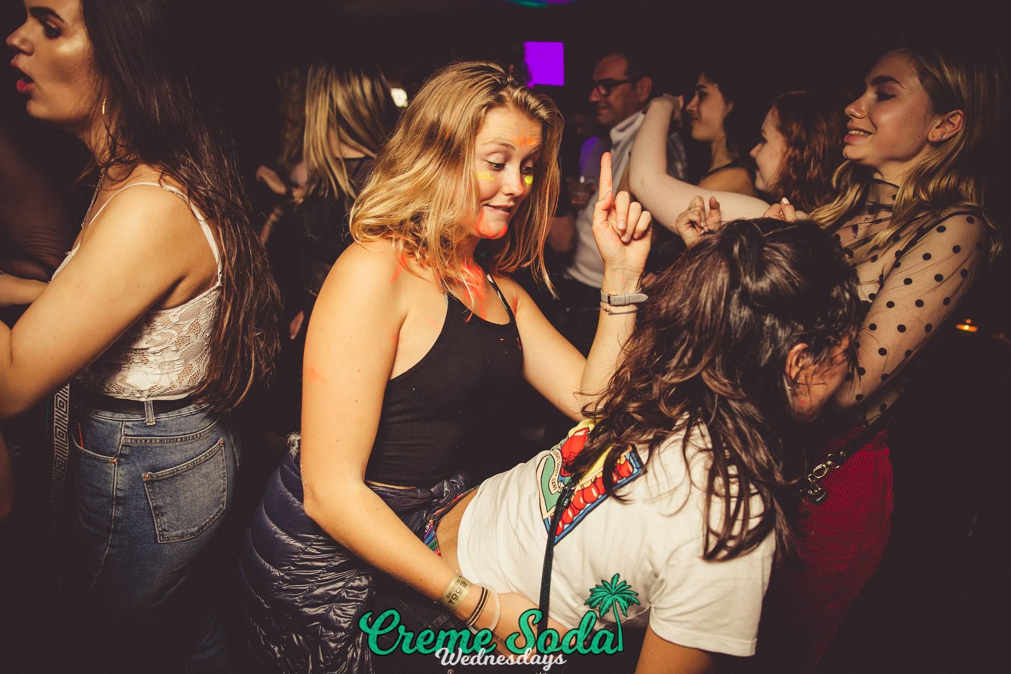Image may contain: Night Life, Night Club, Club, Make Out, Person, People, Human