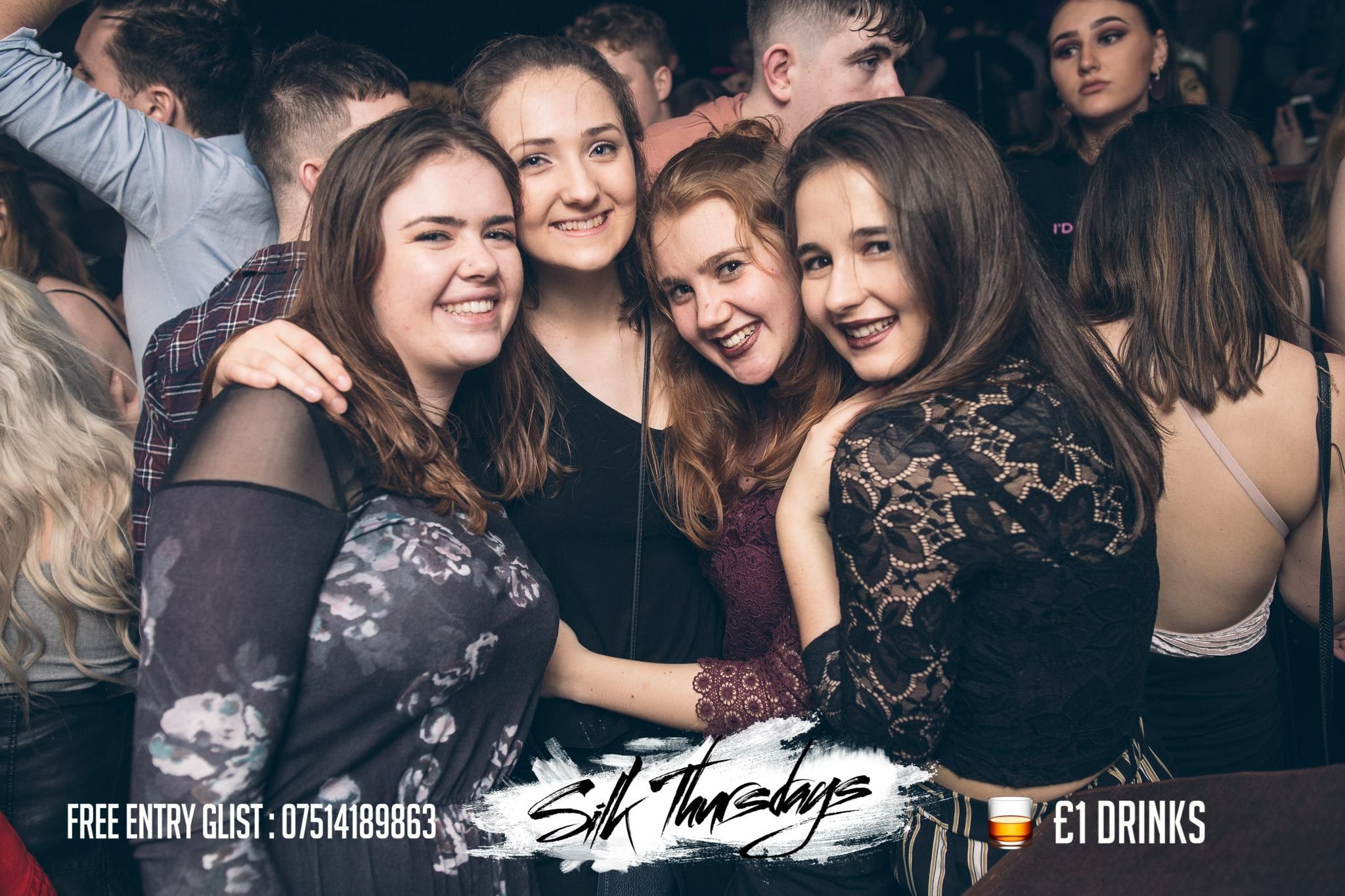 Image may contain: Crowd, Party, Smile, Portrait, Face, Night Life, Night Club, Club, Person, People, Human