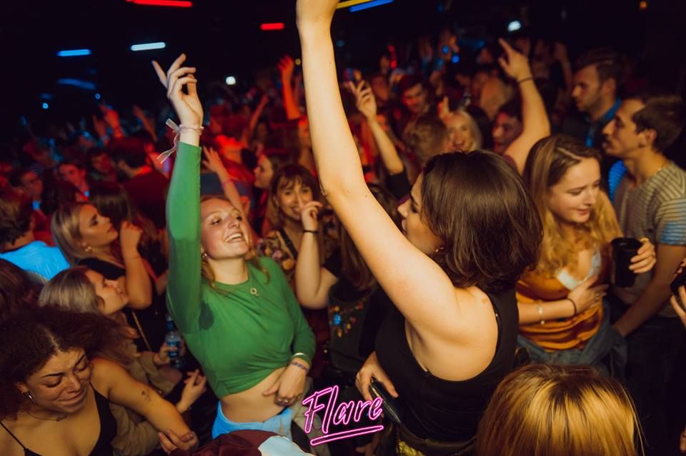 Image may contain: Party, Music, Leisure Activities, Crowd, Hair, Afro Hairstyle, Person, People, Human