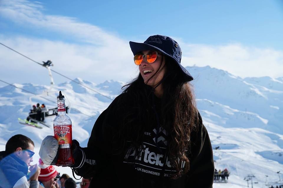 Image may contain: Bottle, Snow, Coke, Coca, Ice, Mountain Range, Peak, Beverage, Drink, Mountain, Hat, Clothing, Apparel, Outdoors, Sunglasses, Accessories, Accessory, Nature, Human, Person