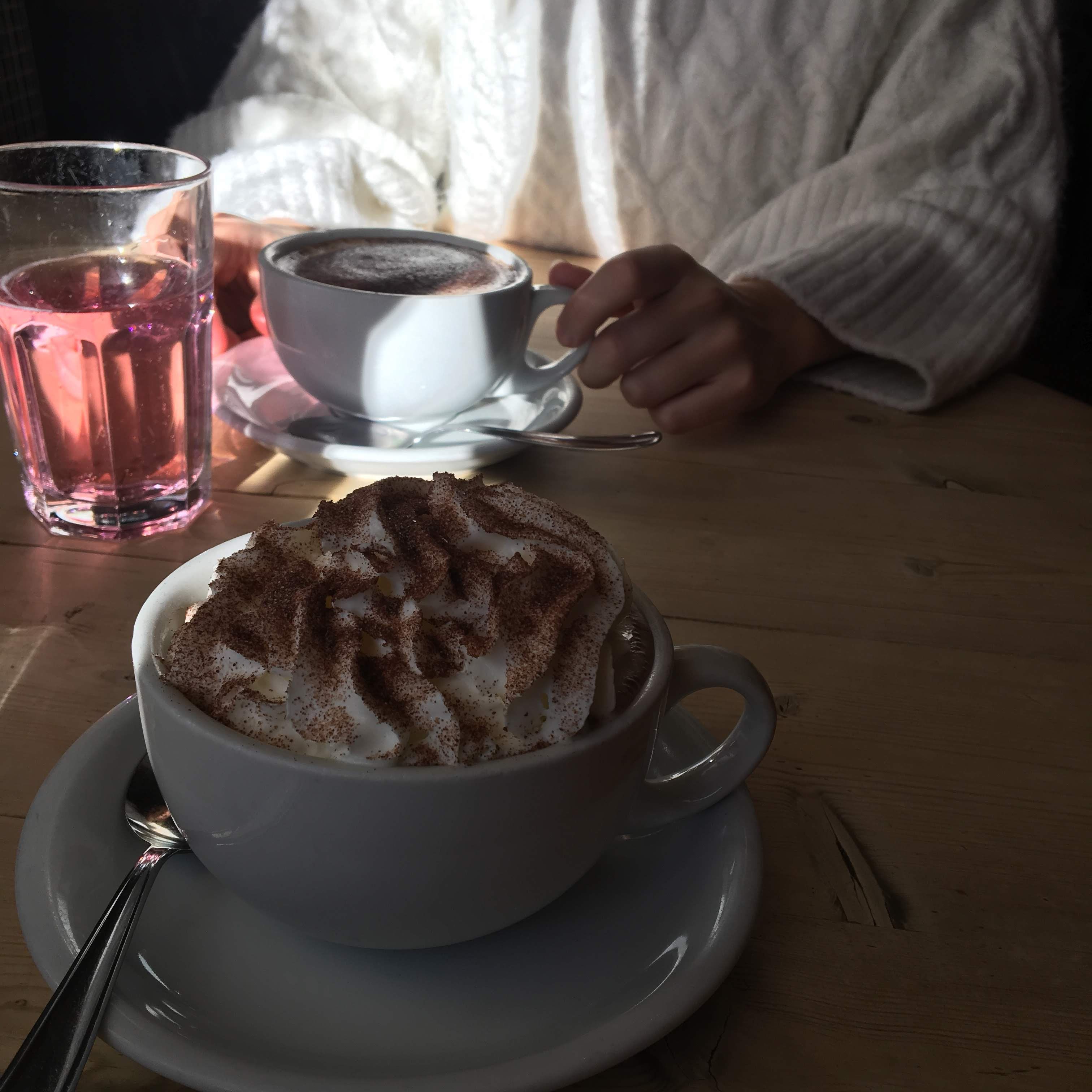 Image may contain: Cafe, Restaurant, Human, Person, Cup, Coffee Cup, Saucer, Pottery