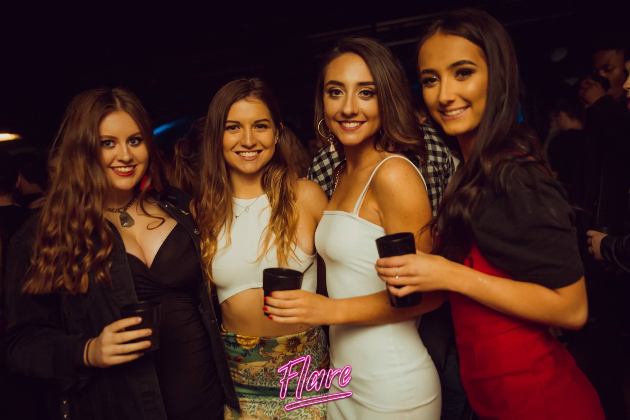 Image may contain: Clothing, Gown, Fashion, Evening Dress, Apparel, Robe, Night Life, Night Club, Club, Party, Human, Person