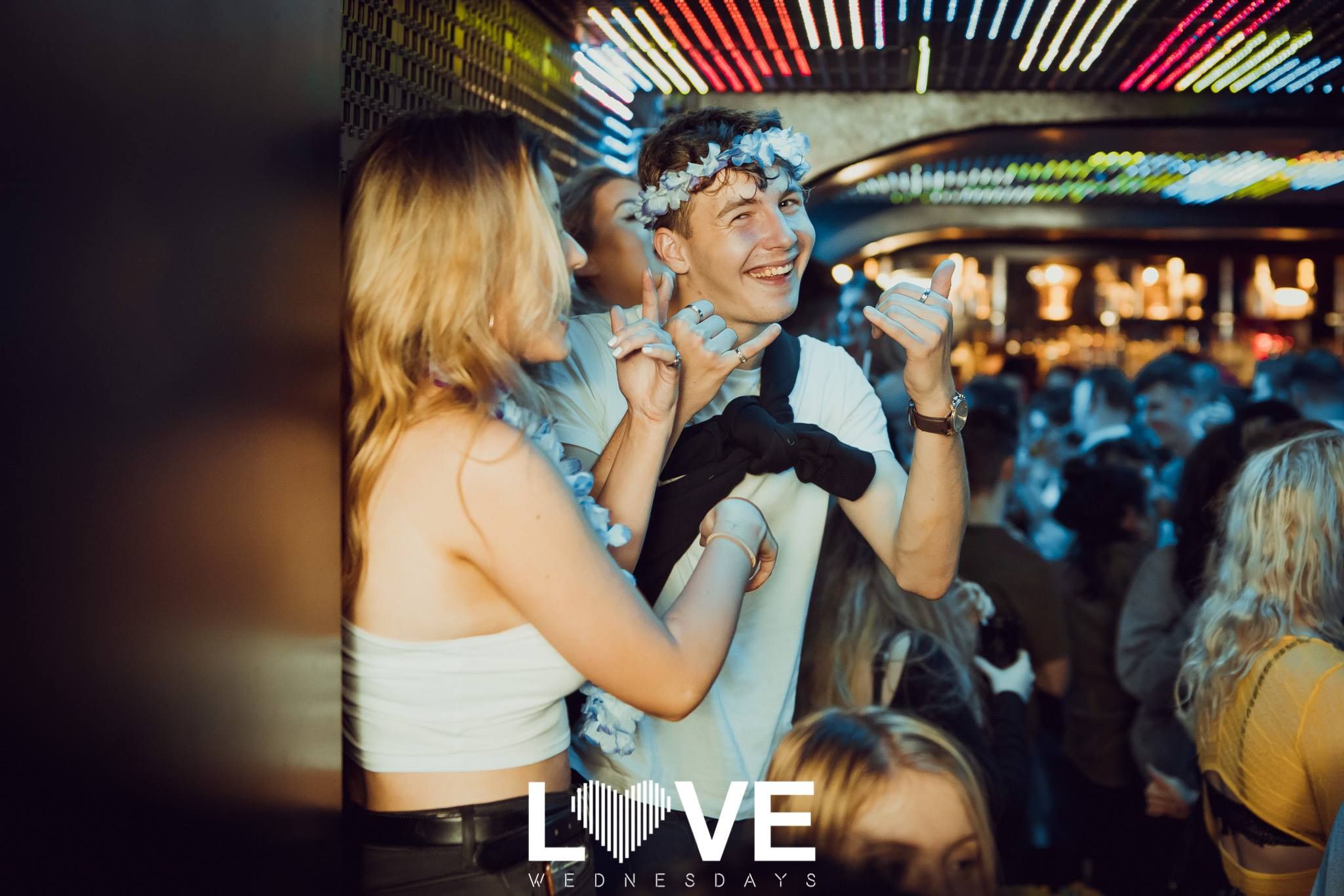Image may contain: Crowd, Night Club, Club, Party, Apparel, Clothing, Night Life, Human, Person