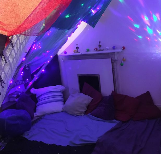 Image may contain: Dorm Room, Interior Design, Light, Lighting, Housing, Building, Bed, Furniture, Purple, Indoors, Room, Bedroom