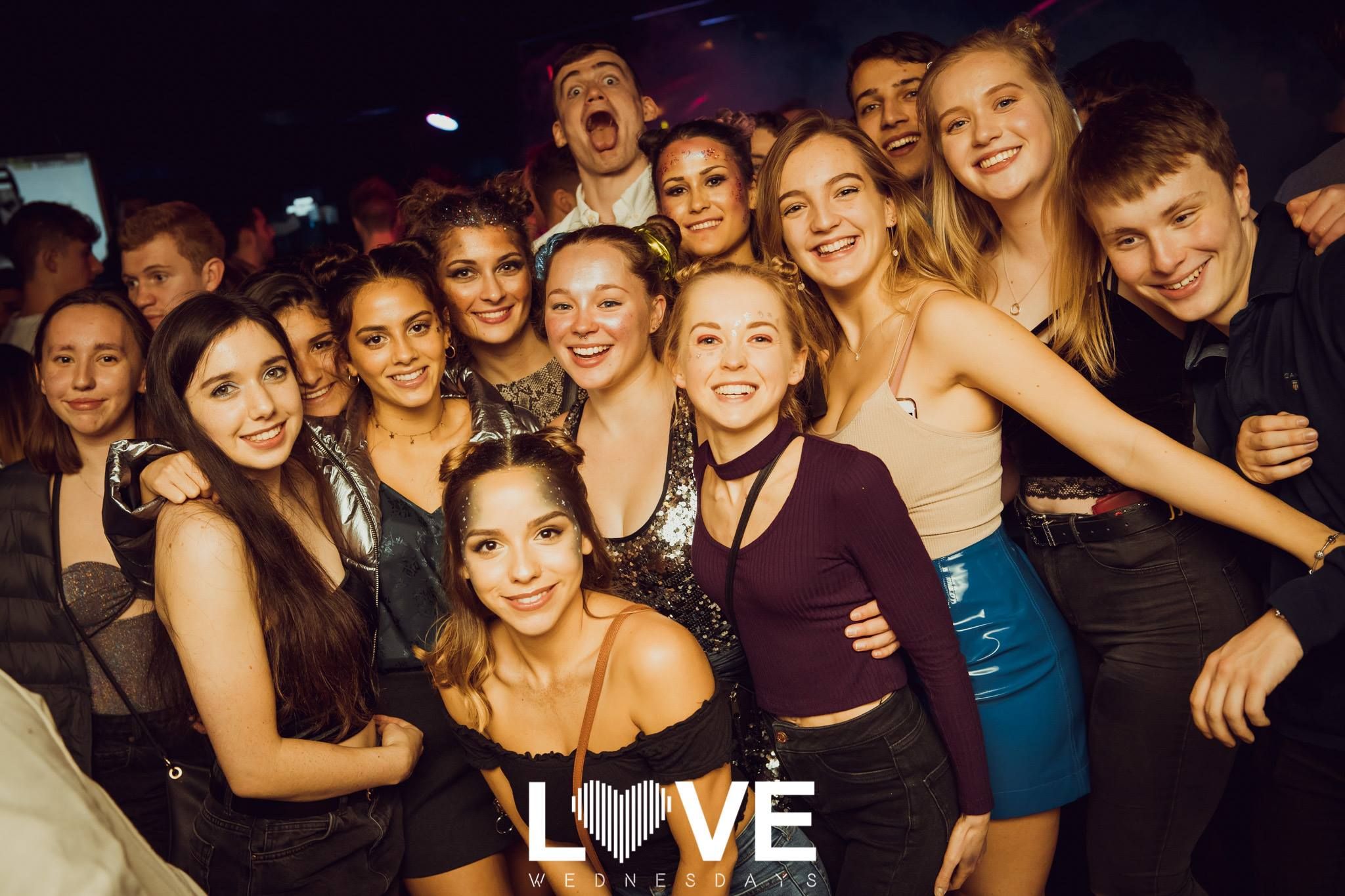 Image may contain: Face, Disco, Night Life, Night Club, Club, Party, Human, Person